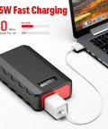 Massive 24000mAh Portable Power Bank With 110V 65W AC Outlet 88.8Wh Power Station fast charging a laptop