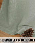 Close-up of Living Room Linen Blend Curtains with open weave showing Sea Grass color and light filtering texture.