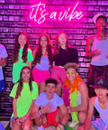 Group of teenagers with Custom Neon Sign Lit Up Name Sign LED Light For Wall Decor Bedroom Wedding Party Bar Shop