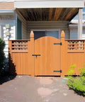 Wooden gate with Industrial Strength 12 Inch T Strap Gate Hinges 4mm Thick 180 Degree Swing Rust Proof Black Steel for garden gates.