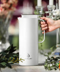 Real Deal Thermal Coffee Carafe Holds Fifty Ounces Advanced Vacuum Insulated Stainless Steel Beverage Dispenser in white.