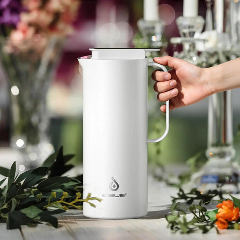 Real Deal Thermal Coffee Carafe Holds Fifty Ounces Advanced Vacuum Insulated Stainless Steel Beverage Dispenser in white.