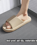 Heavy Duty Non Slip Poolside Floor Mat, Fast Drain Bathroom Anti Fatigue Tile With Wave Channels, showing beige slide on mat.
