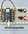 12 Pack TTP223 Capacitive Touch Sensor Modules Gold Edition With Immersion Gold Plating in use on brick-compatible board.