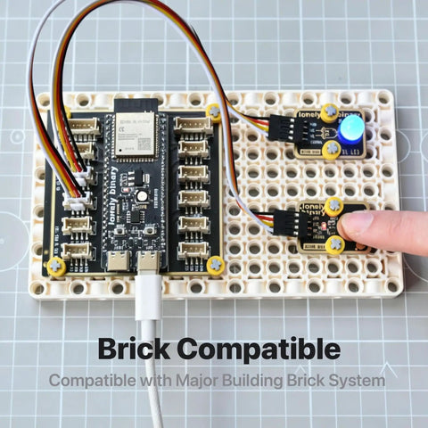 12 Pack TTP223 Capacitive Touch Sensor Modules Gold Edition With Immersion Gold Plating in use on brick-compatible board.