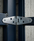 Set Of 6 Heavy Duty 4 Inch Silver T Strap Hinges For Barn Gates And Exterior Doors Premium Steel Build attached to a gate.