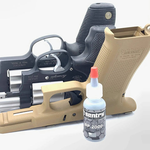 BP2000 Dry Powder Lubricant For Triggers Bores Bolts And Slides Reduces Friction And Keeps Surfaces Oil Free And Dry Ideal For Hinges Locks And High Wear Areas No Mess Application 0.1 Oz Bottle shown with firearm parts