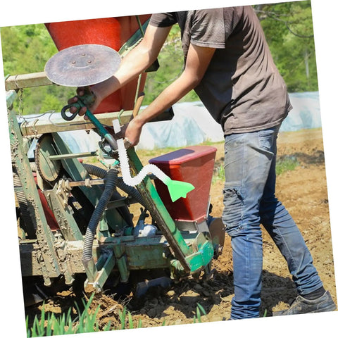 Farmer adjusting Adjustable Seed Planter Tube Kit For Even Seed Spreading In Corn And Wheat Fields Replacement Seeder Accessory
