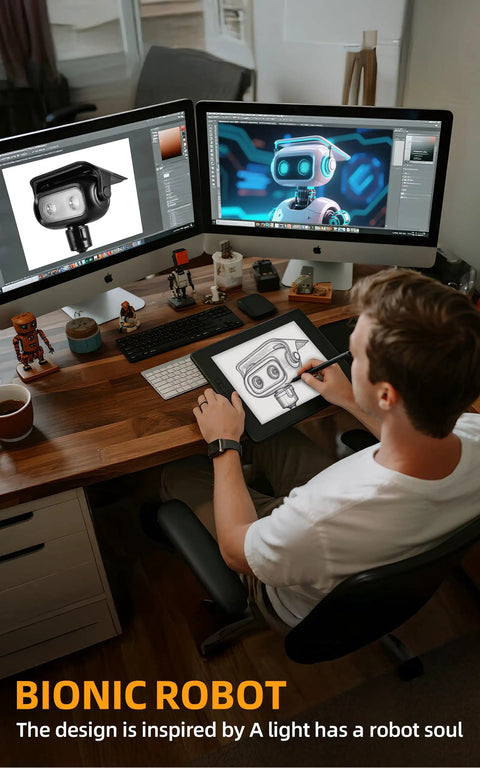 Designer sketching robot-inspired solar spotlight on tablet with computer screens showing robotic designs