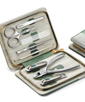 Eight In One Manicure And Pedicure Kit With Stainless Steel Nail Clippers Personal Care Tools In Durable PU Leather Case Green Finish For At Home Grooming And Travel, Includes Oblique Clipper, Facial Hair Scissors, Eyebrow Tweezer And Nail File displayed in case