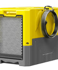 Side view of yellow Heavy Duty 190 Pints Industrial Grade Dehumidifier For Basements And 6000 Sq Ft Spaces with drain hose.
