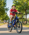 Child riding Kids Mountain Bike 20 And 24 Inch For Boys And Girls Ages 7 To 12, 7 Speed Gear, blue color, in a park