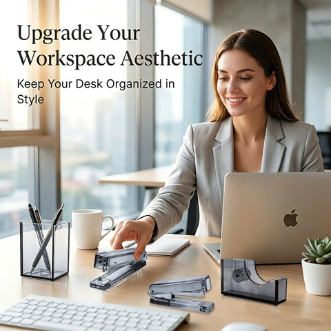 Woman using Smoke Grey 4 Piece Acrylic Office Desk Gear Kit, Transparent Desk Organizer Set, Minimalist Workspace Essentials For Retail And Business Gift, Includes Two Staplers, Pen Cup, Tape Dispenser, OEM Custom Logo Ready For Branding on desk