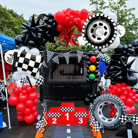 Outdoor party arch with Lit Race Car Balloons Checkered Flag And Tire Balloons Red Black White Latex 12 Inch 35 Piece Party Decor Kit.