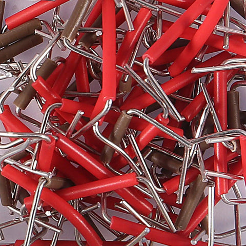 Close-up of red and brown rigid insulated wires from the 560 Piece Jumper Wire Kit With 14 Lengths For Breadboard Prototyping And Arduino Projects