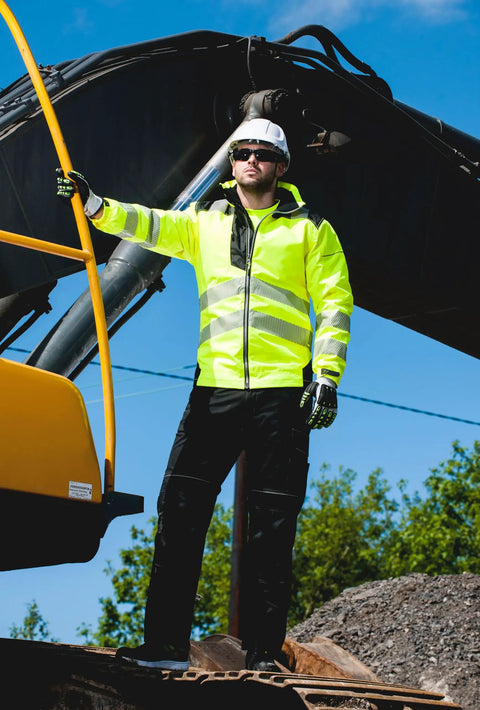 Worker wearing Hi Vis Winter Work Jacket With Reflective Waterproof Shell And Thermal Quilted Lining ANSI 3 Safety Coat X Large outdoors
