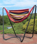 Hanging Hammock Chair With Space Saving Stand For Indoor And Outdoor Use 330 Pound Capacity Sunset Cotton Seat, outdoors view