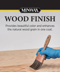 Applying Top Shelf Oil Based Wood Stain In Special Walnut with a brush on a wood surface for even color and smooth penetration.