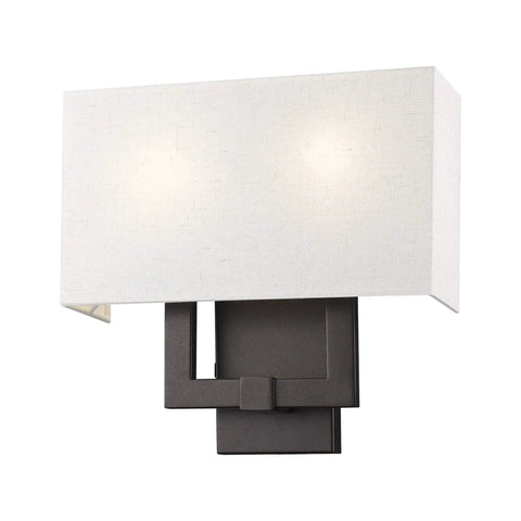 Meridian Collection Transitional Two Light Wall Sconce in English Bronze finish with warm oatmeal fabric shade and sleek angular arm.