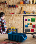 Heavy Duty Wall Mount Wire Spool Rack Featuring Six Adjustable Rods And Rust Resistant Steel For Garage Cord Organization That Handles Daily Grind Like A Champ in a garage setting.