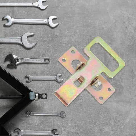 Heavy Duty Sofa Connector Buckles For A Rock Solid Couch Setup next to wrenches, showcasing interlocking iron linkage.