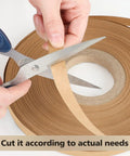 Close-up of cutting Professional Grade Upholstery Tack Strip Half Inch Wide By Seventy Yards Long for tailored use.