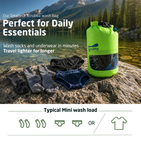 Pocket Friendly Travel Laundry Sack With A Built In Washboard Surface For Quickly Scrubbing Down Socks And Undies While Backpacking Or Hitting The Road Without Lugging Heavy Machines Or Clunky Gear, on a rock by water with socks and underwear.