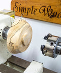 American Made Vacuum Chuck For Wood Turning Lathe With 1 Inch By 8 TPI Threads CNC Machined Aluminum holding a wooden bowl