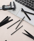 30 Piece 2.54mm 40 Pin Male And Female Header Pins Set on a desk with a laptop and tools for PCB projects