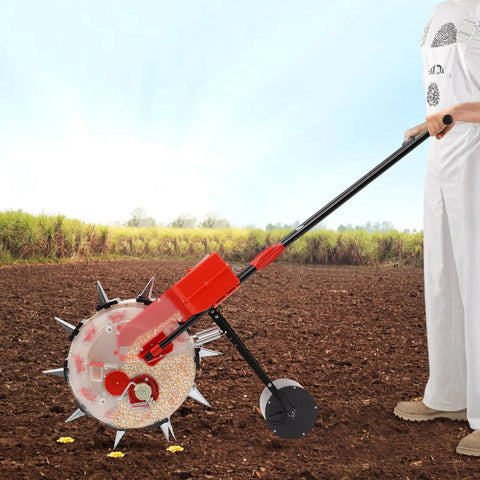 Person using walk behind garden seeder spreader and planter with 10 nozzles for precise sowing and fertilizer application in a field.