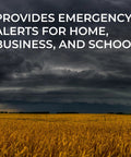 Stormy sky over field; WR120B NOAA Emergency Weather Alert Radio With Localized Programming, Trilingual Display in action.