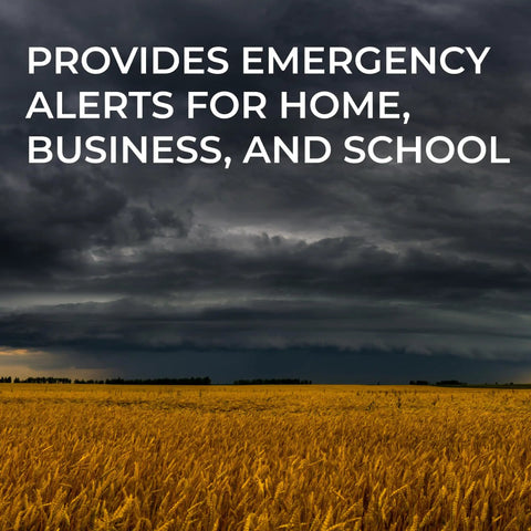 Stormy sky over field; WR120B NOAA Emergency Weather Alert Radio With Localized Programming, Trilingual Display in action.
