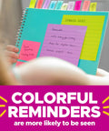 Kickass 3x3 Inch Pop Up Dispenser Notes 12 Pack in bright colors on a notebook for easy reminders and organization.