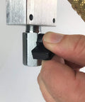 Hand adjusting shutoff valve on Solid 7 Piece Air Line Fitting Kit 1 2 Inch Push To Connect Pneumatic Outlet Block.