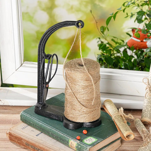 Cast Iron Twine Holder Set With 1300ft Natural Jute Twine on wooden table, includes scissors, antique sewing machine style, black finish
