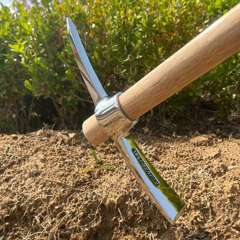 2 In 1 Gardening Pick Axes With Stainless Steel Double Headed Mattock And Wooden Handle Ergonomic Grip in use for weeding