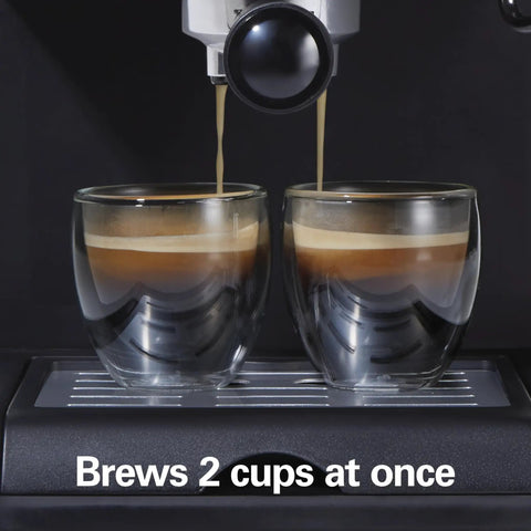 15 Bar Espresso Machine For Sippin Straight Up Lattes And Creamy Cappuccinos With Dual Auto Frother Brews Two Cups At Once Compatible With Pods Or Grounds 50 Oz Tank Black brewing two glasses of espresso.