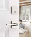Halifax Keyed Entry Lever And Single Cylinder Deadbolt Combo With SmartKey Security In Satin Nickel For Exterior Doors Built Tough And Easy Install Backset And Thickness Guide Included on a white door