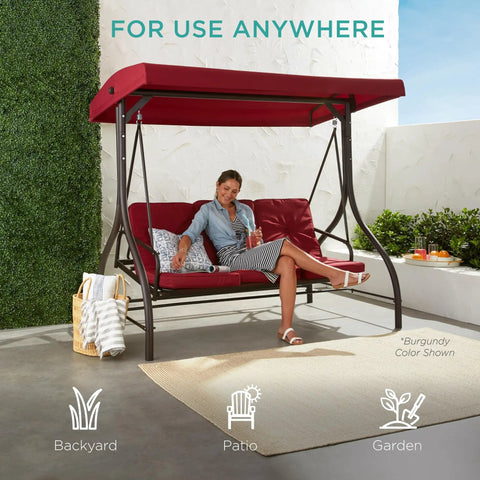 Three Seat Outdoor Canopy Swing Glider With Convertible Flatbed Patio Hammock in burgundy, porch and backyard setting