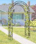Sturdy Rust-Resistant Metal Garden Arch With Trellis For Climbing Plants 88 Inches High By 51 Inches Wide Outdoor Wedding Arch For Ceremony Durable 20mm Pipe Construction stands in a garden.