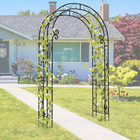 Sturdy Rust-Resistant Metal Garden Arch With Trellis For Climbing Plants 88 Inches High By 51 Inches Wide Outdoor Wedding Arch For Ceremony Durable 20mm Pipe Construction stands in a garden.