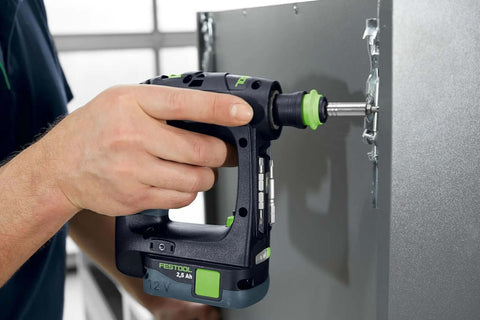 Kickass Cordless Drill Driver Pack Featuring Knockout Torque And Boss Level Brushless Motor With No Sweat Ergonomic Grip And Quick Swap Battery System For Serious Woodworking And Auto Repairs being used to screw into metal.