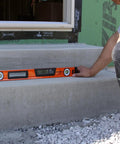 Person using Digital Box Level 24 Inch With High Accuracy Plus 0.1 Degree Readout, Orange Construction Tool For Carpentry And Masonry