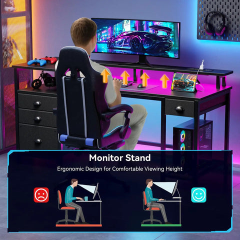 Person sitting at 60 Inch Black Computer Desk With 4 Drawers And Printer Space, LED Lights, USB Power Outlets, Shelving