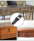 Heavy Duty 4 Pack Spring Toggle Latch 2.8 Inch Black Stainless Steel Cabinet Door Latch on various wooden drawers and a suitcase.