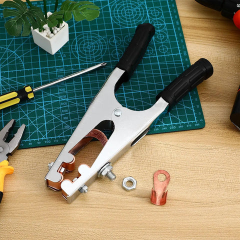 Heavy Duty Welding Ground Clamp With Iron And Copper Construction For Welders Offering Firm Grip and Sturdy Design on workspace.