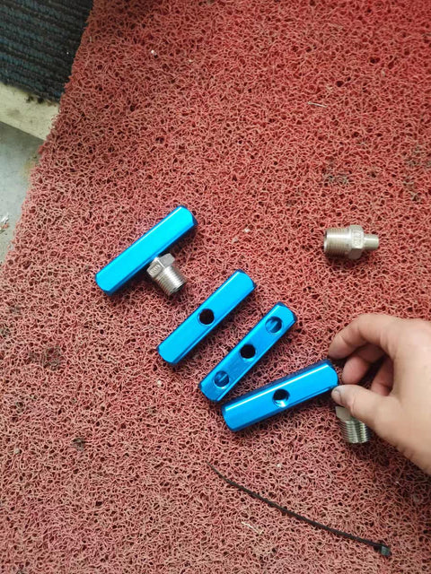 Three Pack One Half Inch Thread Three Way Manifold Block Splitter Quick Connect Air Hose Splitter Coupler parts on mat