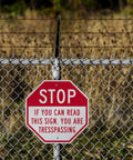 Tough As Nails Custom Stop Sign 18 X 18 Inches With Super Slick 3M Reflective Finish Hella Durable Rustproof Aluminum Metal For Outdoor Parking Lots Gates And Garages Usa Made attached to a chain link fence.