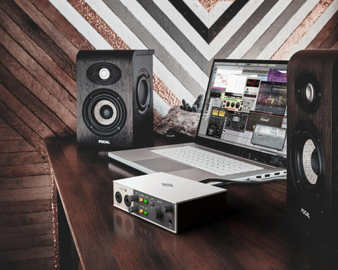 Volt 2 USB Audio Interface With Vintage Preamp Mode And 24-Bit 192 KHz Conversion on desk with speakers and laptop in home studio