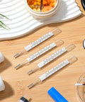 Glass Thermometer Set For Adults Four Pack Dual Scale Fahrenheit Celsius Fast Reading Old Fashioned Temperature Tools For Home Use Family Care Accurate And Reliable Temperature Testing, four glass thermometers on wood